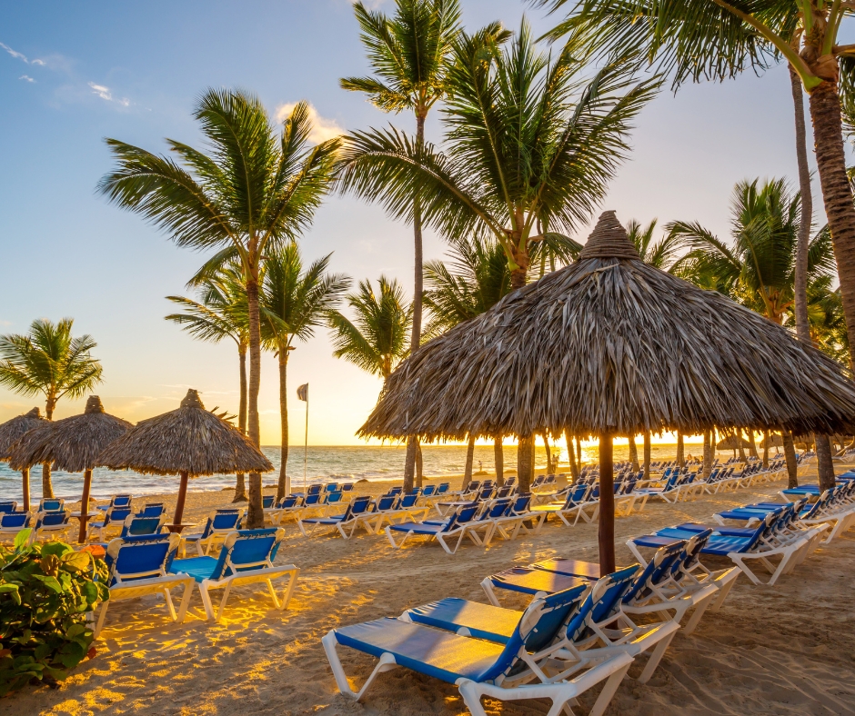 Private beach of an all-inclusive hotel in Punta Cana with a sunset